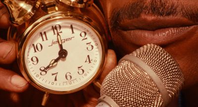 Still from Do the Right Thing (1989) that has been tagged with: microphone & clock