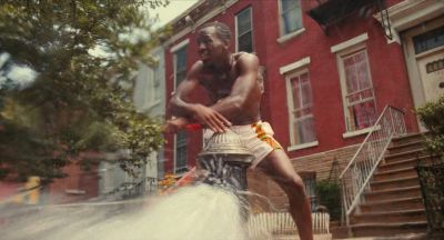Still from Do the Right Thing (1989) that has been tagged with: day & fire hydrant & wide shot