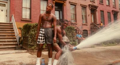 Still from Do the Right Thing (1989) that has been tagged with: two-shot & fire hydrant