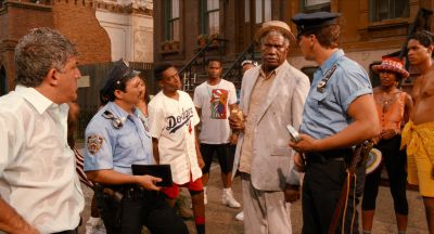 Still from Do the Right Thing (1989) that has been tagged with: 9a6a60 & group-shot