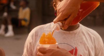 Still from Do the Right Thing (1989) that has been tagged with: pouring & italian ice