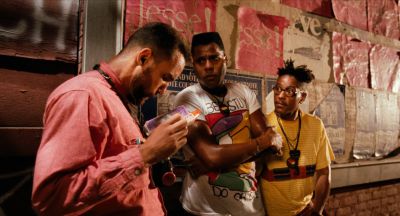 Still from Do the Right Thing (1989) that has been tagged with: three-shot & medium wide