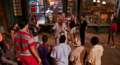 Still from Do the Right Thing (1989) that has been tagged with: d11020 & wide shot & group-shot & exterior