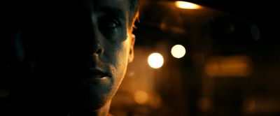 Still from Drive (2011) that has been tagged with: c5b359 & night & close-up