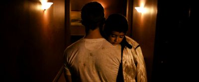 Still from Drive (2011) that has been tagged with: hallway & medium wide & interior & over-the-shoulder