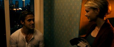 Still from Drive (2011) that has been tagged with: interior & doorway & medium shot & night