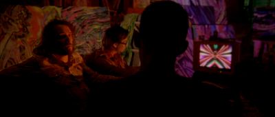 Still from Enter The Void (2009) that has been tagged with: e18e96 & night & interior & medium shot