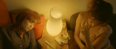 Still from Enter The Void (2009) that has been tagged with: medium shot & pregnancy test