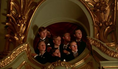 Still from Fanny and Alexander (1982) that has been tagged with: medium wide & group-shot & day & audience