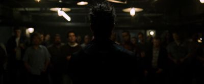 Still from Fight Club (1999) that has been tagged with: group-shot & over-the-shoulder & basement