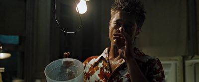Still from Fight Club (1999) that has been tagged with: 7e461b & smoking & practical lamp & bare bulb