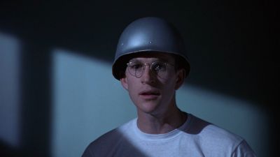 Still from Full Metal Jacket (1987) that has been tagged with: night & medium close-up & clean single & helmet