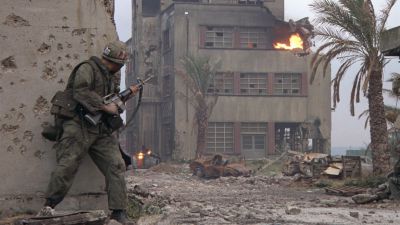 Still from Full Metal Jacket (1987) that has been tagged with: war zone & over-the-shoulder