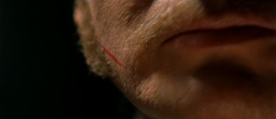 Still from Gangs of New York (2002) that has been tagged with: 6e1c1c & interior & extreme close-up
