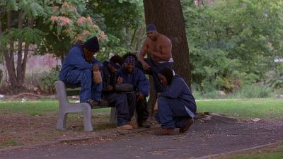 Still from Ghost Dog: The Way of the Samurai (1999) that has been tagged with: day & park bench & exterior