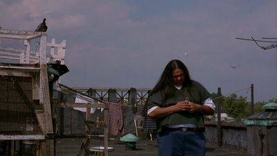 Still from Ghost Dog: The Way of the Samurai (1999) that has been tagged with: rooftop & medium wide