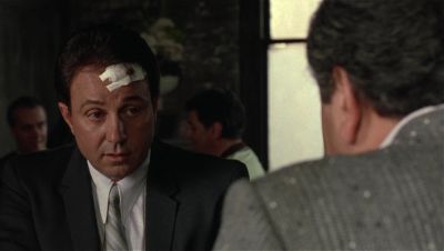 Still from GoodFellas (1990) that has been tagged with: 5a2720 & day & restaurant & medium close-up & over-the-shoulder