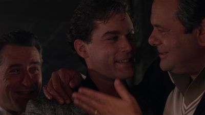 Still from GoodFellas (1990) that has been tagged with: interior & medium close-up & hug & night