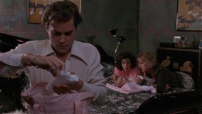 Still from GoodFellas (1990) that has been tagged with: interior & wide shot & group-shot & bed