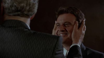 Still from GoodFellas (1990) that has been tagged with: 6e8081 & over-the-shoulder