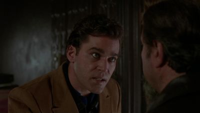 Still from GoodFellas (1990) that has been tagged with: medium close-up & night & two-shot & over-the-shoulder