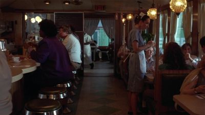 Still from GoodFellas (1990) that has been tagged with: server & profile shot & wide shot