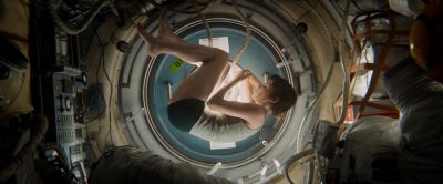 Still from Gravity (2013) that has been tagged with: 836a54 & clean single & space