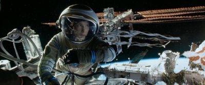 Still from Gravity (2013) that has been tagged with: 4682b4 & exterior & clean single & medium shot