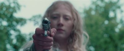 Still from Hanna (2011) that has been tagged with: close-up & gun & bokeh