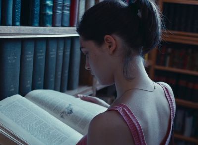 Still from Happening (2021) that has been tagged with: reading & library