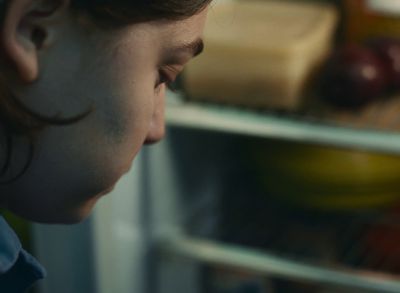 Still from Happening (2021) that has been tagged with: fridge & close-up