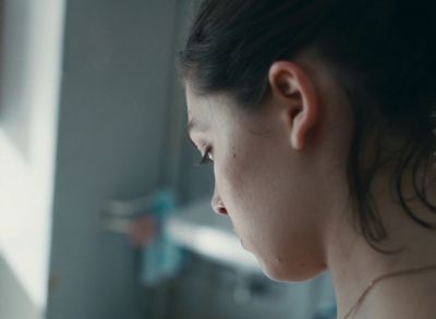 Still from Happening (2021) that has been tagged with: hospital & close-up