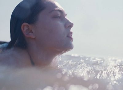 Still from Happening (2021) that has been tagged with: swimming & close-up