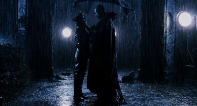 Still from Hellboy (2004) that has been tagged with: wide shot & night & two-shot & rain