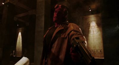 Still from Hellboy (2004) that has been tagged with: 714f38 & practical lamp & low-angle