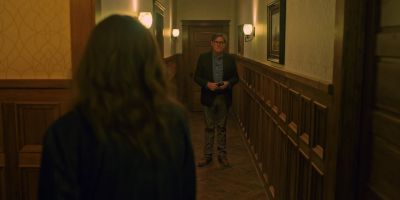 Still from Hereditary (2018) that has been tagged with: hallway & over-the-shoulder