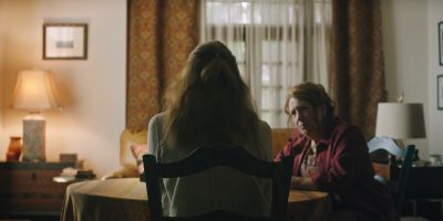 Still from Hereditary (2018) that has been tagged with: dining room & practical lamp & interior