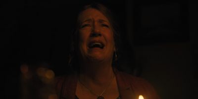 Still from Hereditary (2018) that has been tagged with: clean single & night & medium close-up & interior