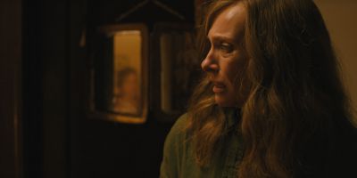 Still from Hereditary (2018) that has been tagged with: profile shot & night & medium close-up