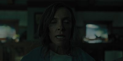 Still from Hereditary (2018) that has been tagged with: close-up & interior & night & clean single