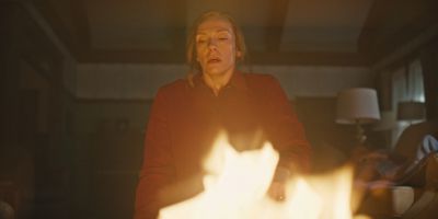 Still from Hereditary (2018) that has been tagged with: medium shot & fire