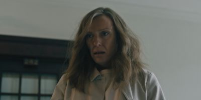 Still from Hereditary (2018) that has been tagged with: 51484f & medium close-up & interior