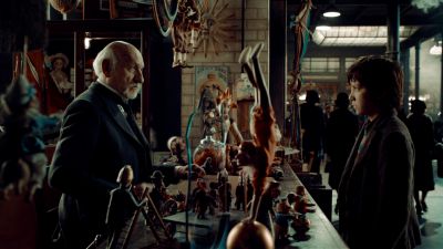Still from Hugo (2011) that has been tagged with: a67a59 & medium wide & store & night