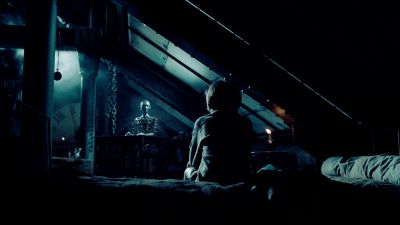 Still from Hugo (2011) that has been tagged with: night & wide shot & over-the-shoulder & interior & attic