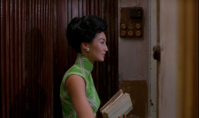 Still from In the Mood For Love (2000) that has been tagged with: clean single & day & hallway & interior & doorway