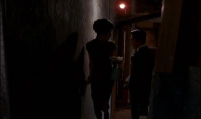 Still from In the Mood For Love (2000) that has been tagged with: over-the-shoulder