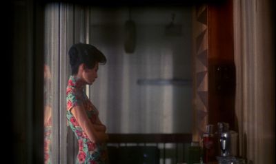 Still from In the Mood For Love (2000) that has been tagged with: interior & medium wide & day & clean single