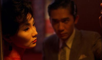 Still from In the Mood For Love (2000) that has been tagged with: medium close-up & interior & night & two-shot