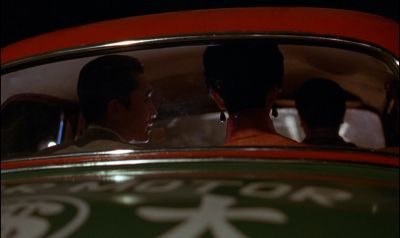Still from In the Mood For Love (2000) that has been tagged with: taxi & backseat