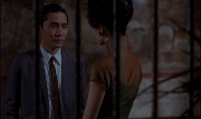 Still from In the Mood For Love (2000) that has been tagged with: 546878 & night & medium wide & interior